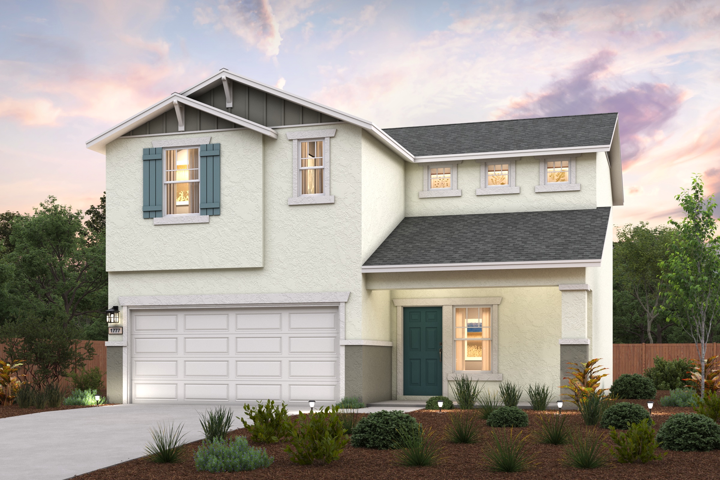 A white house with a garage.