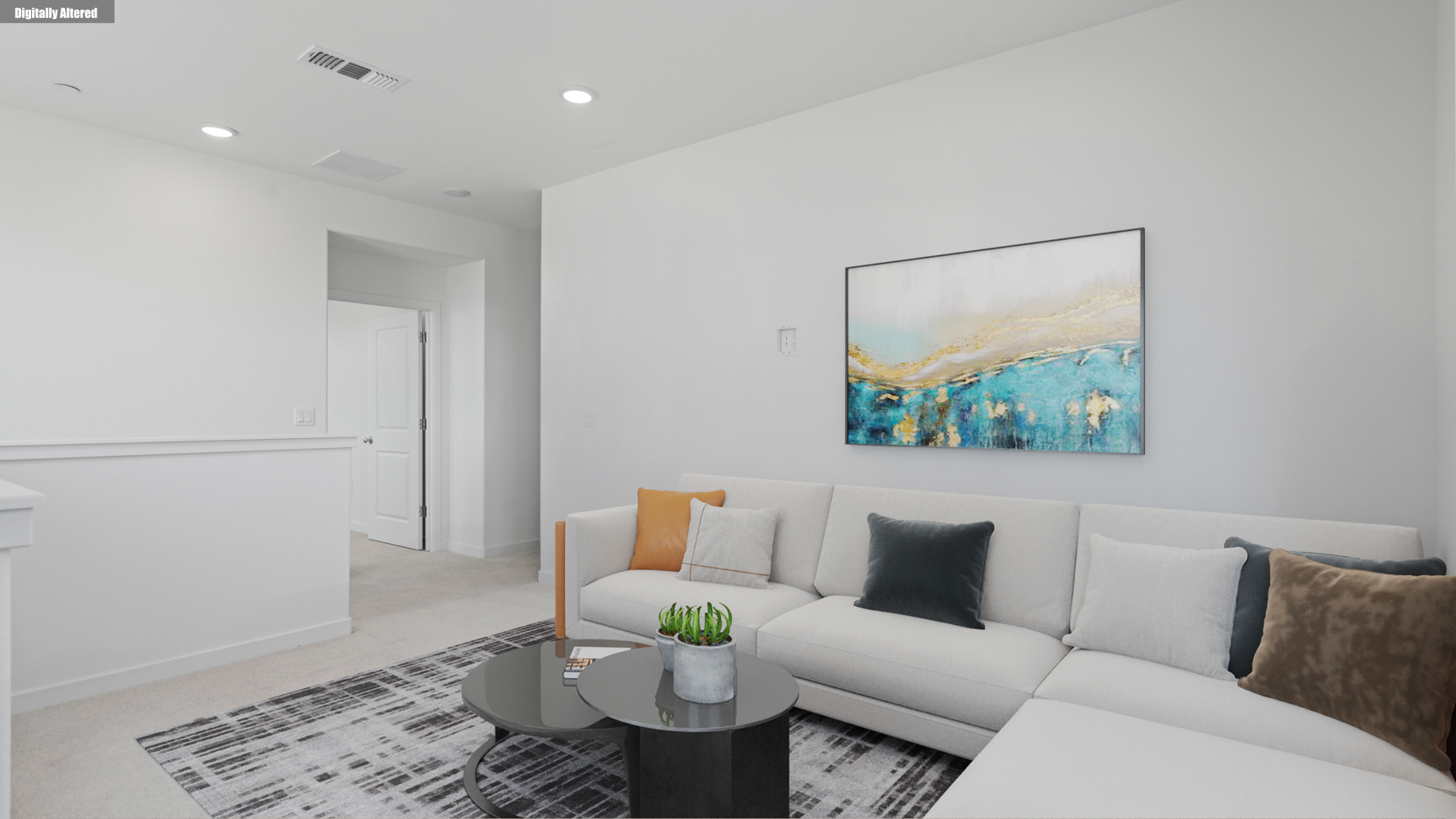 A living room with a couch and a coffee table.