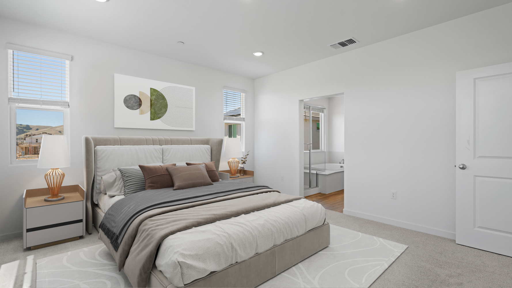 A bedroom with a bed and a lamp.