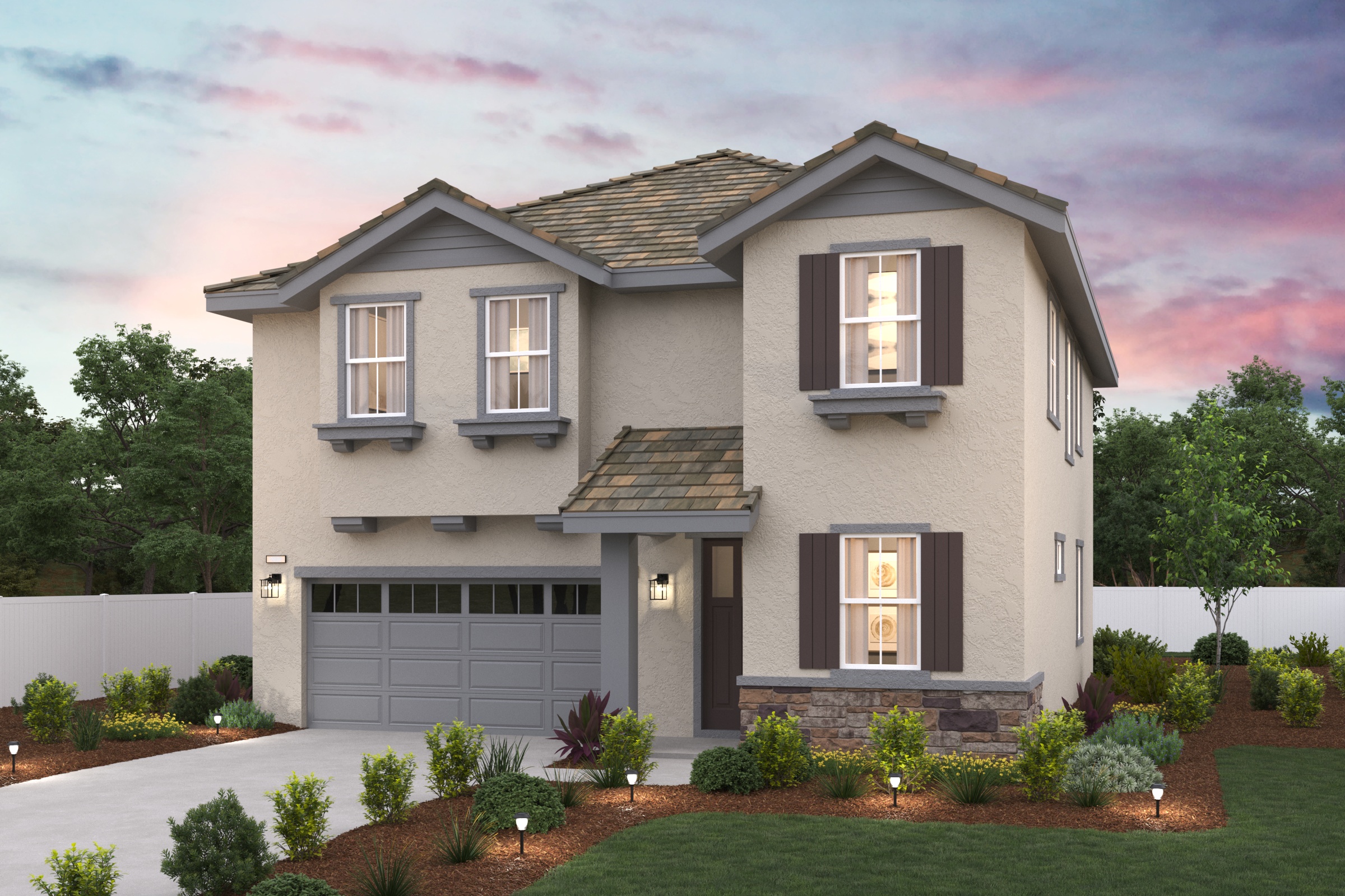 A house with a garage and a lawn in front of it.