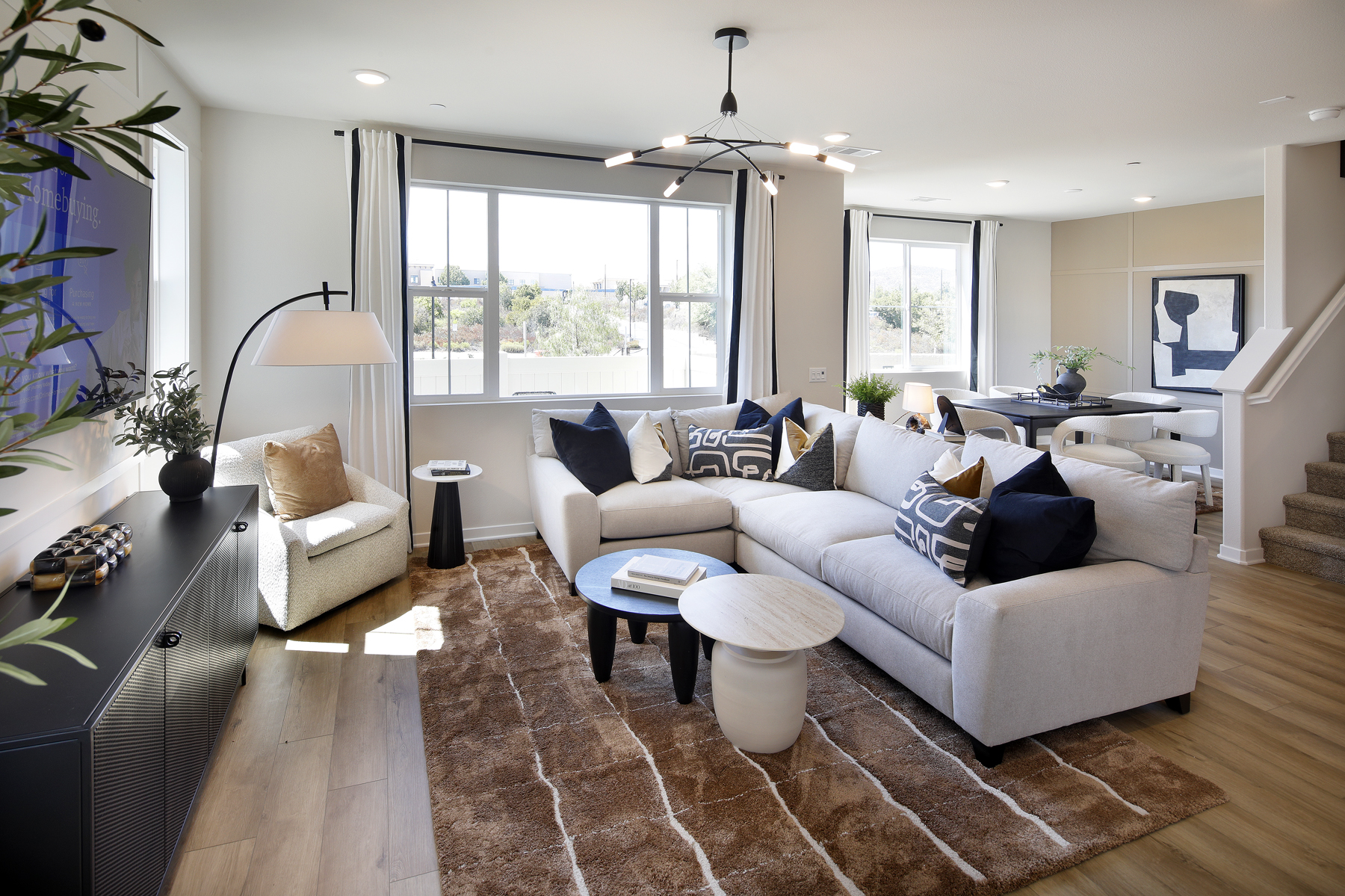 A living room with a large window.