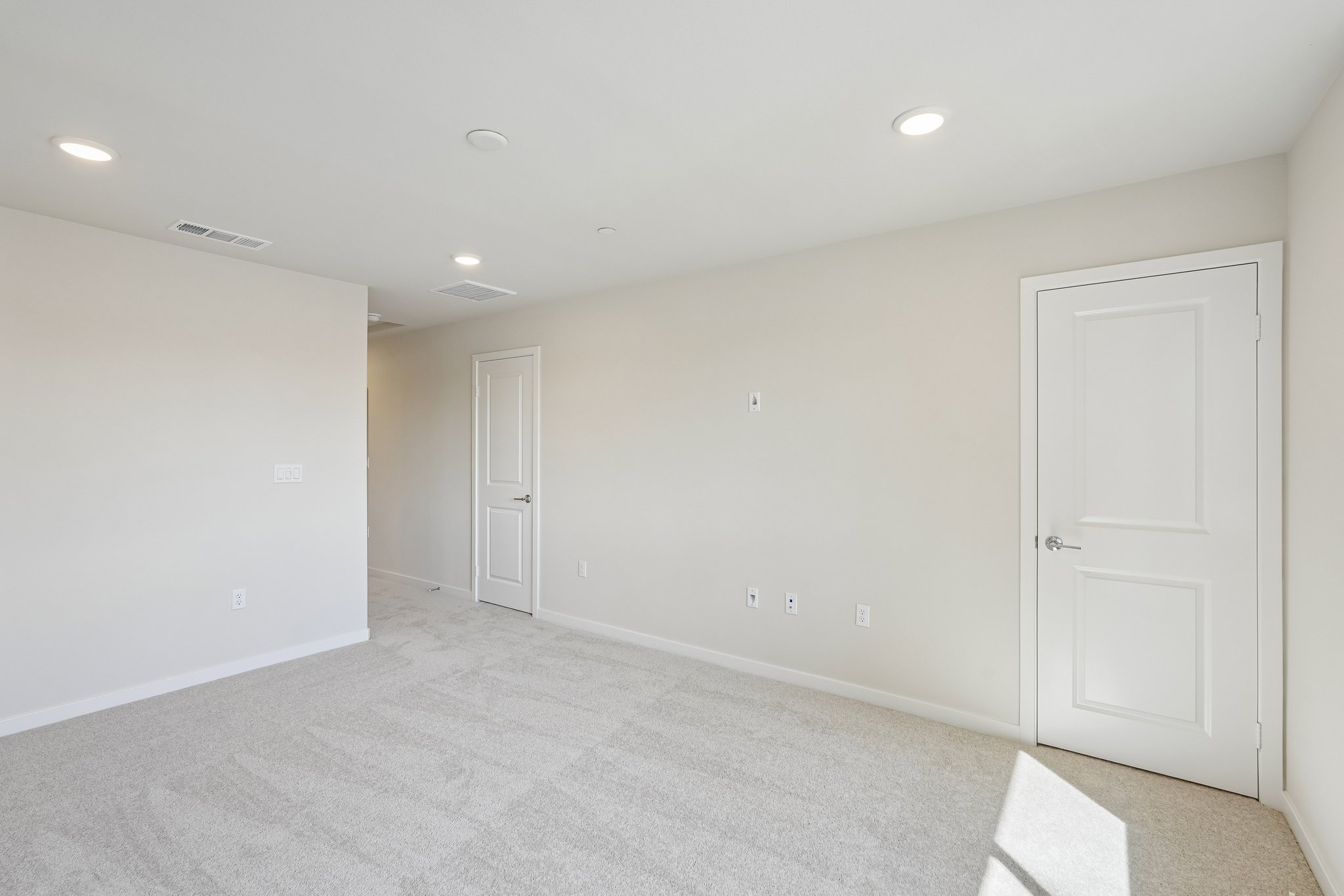 A room with white doors.