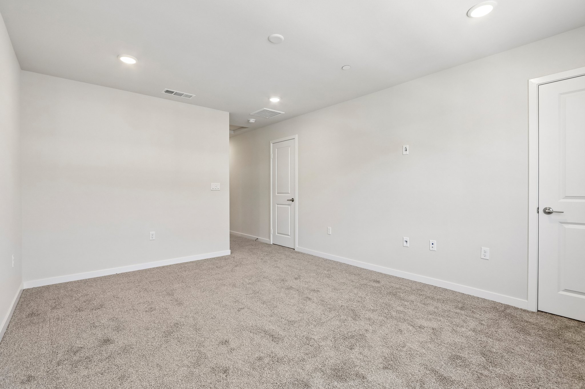 A room with white doors.