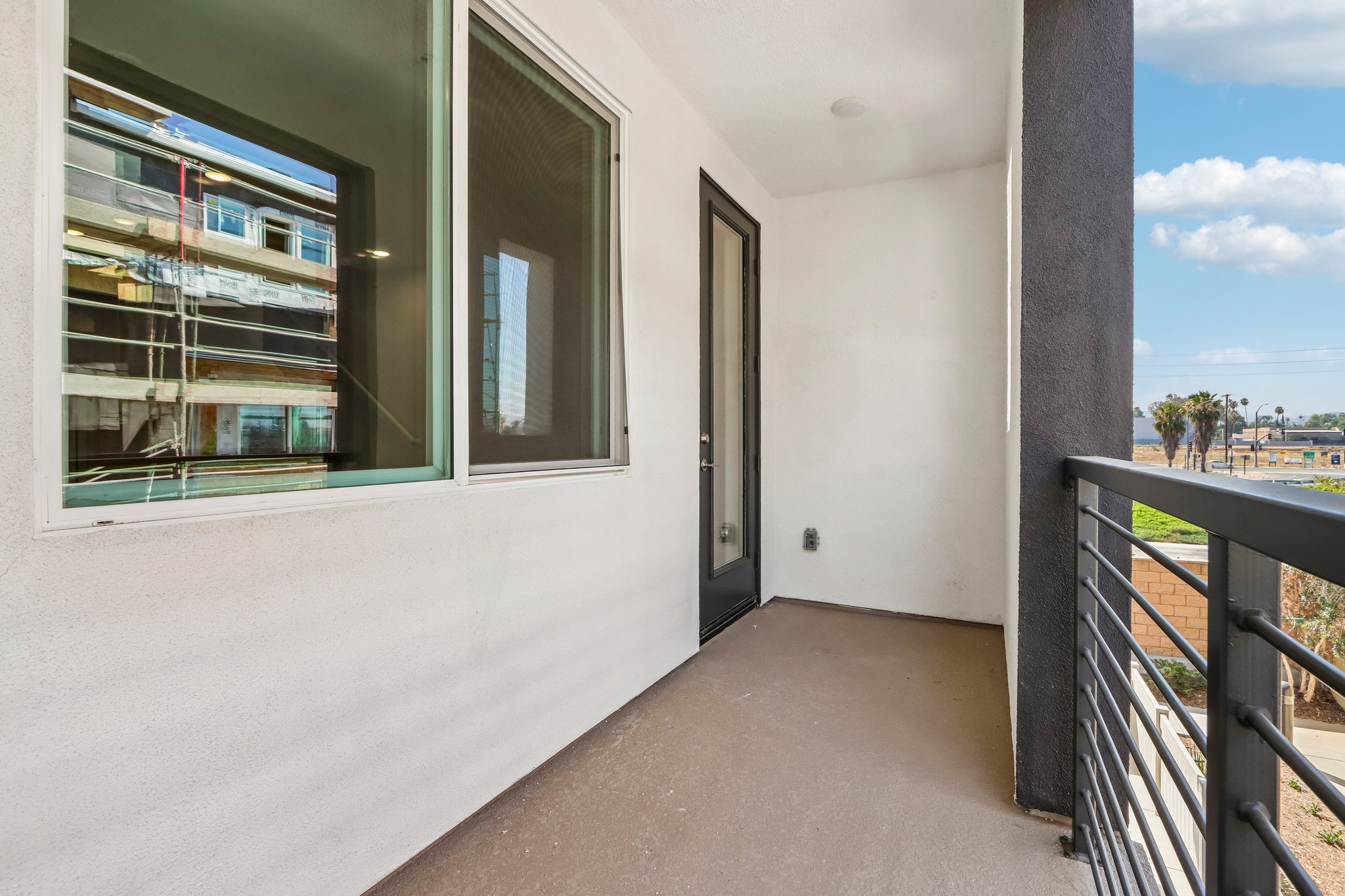 A building with windows and a railing.