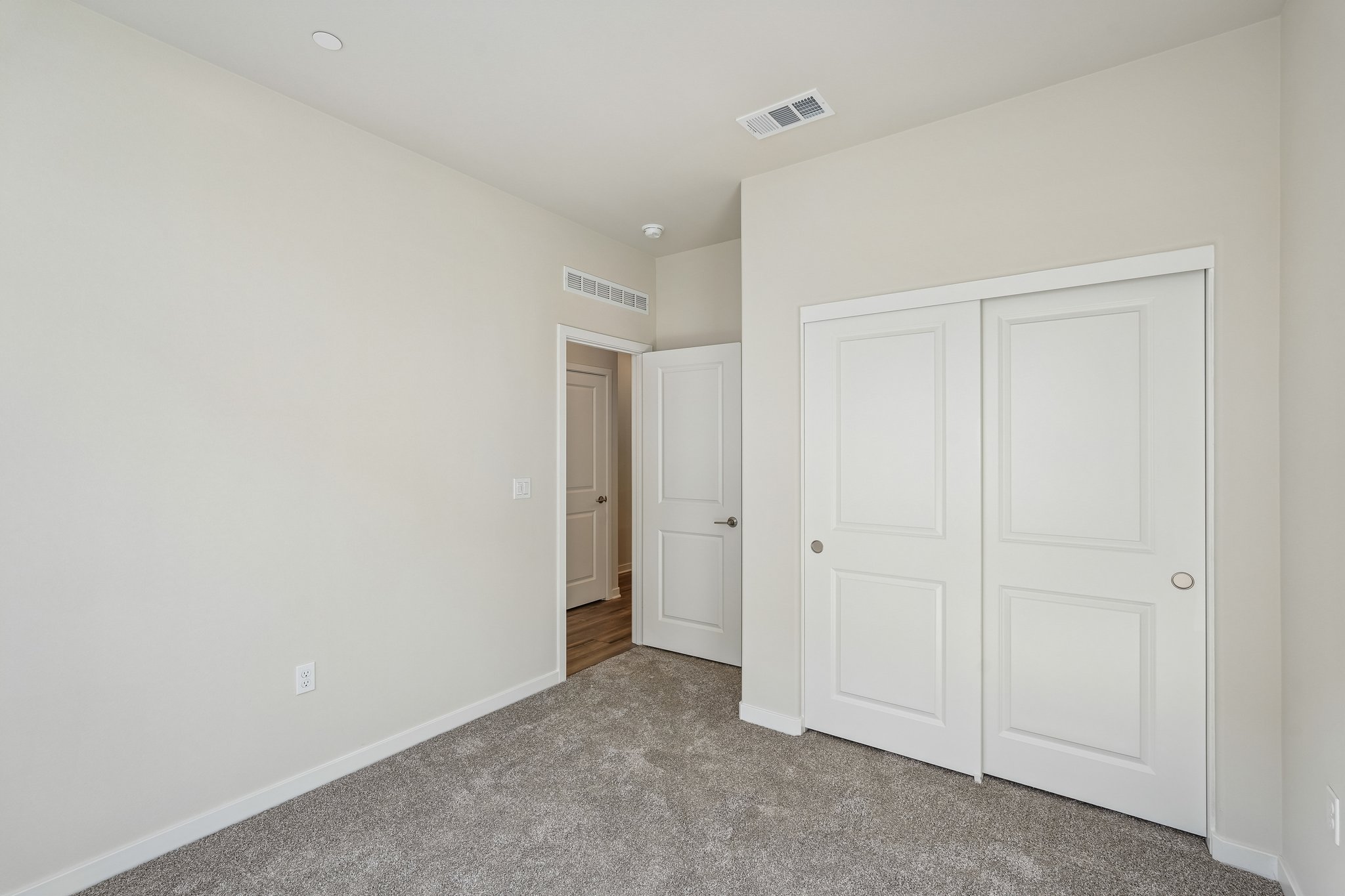 A room with white doors.