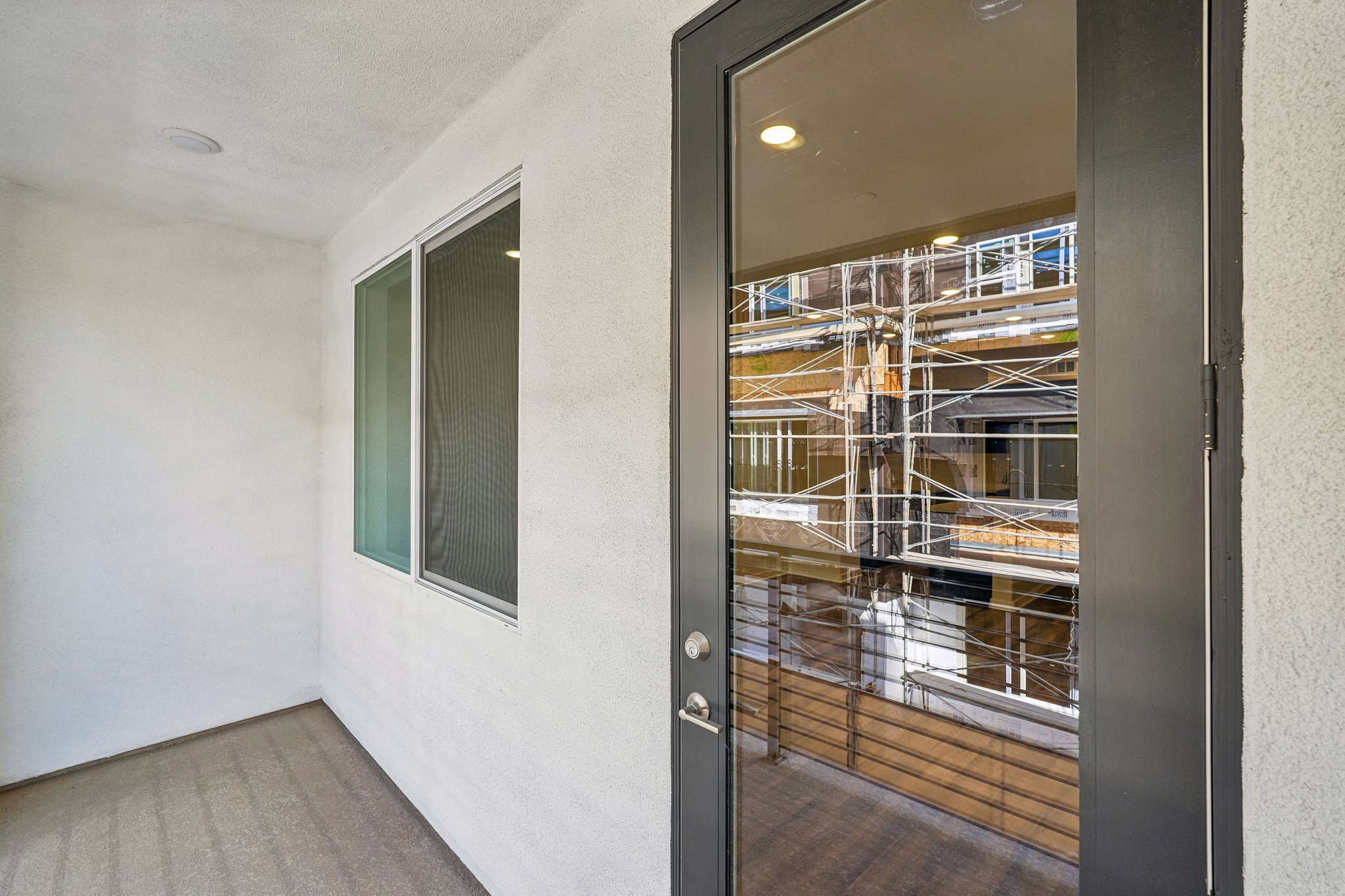 A room with a glass door.