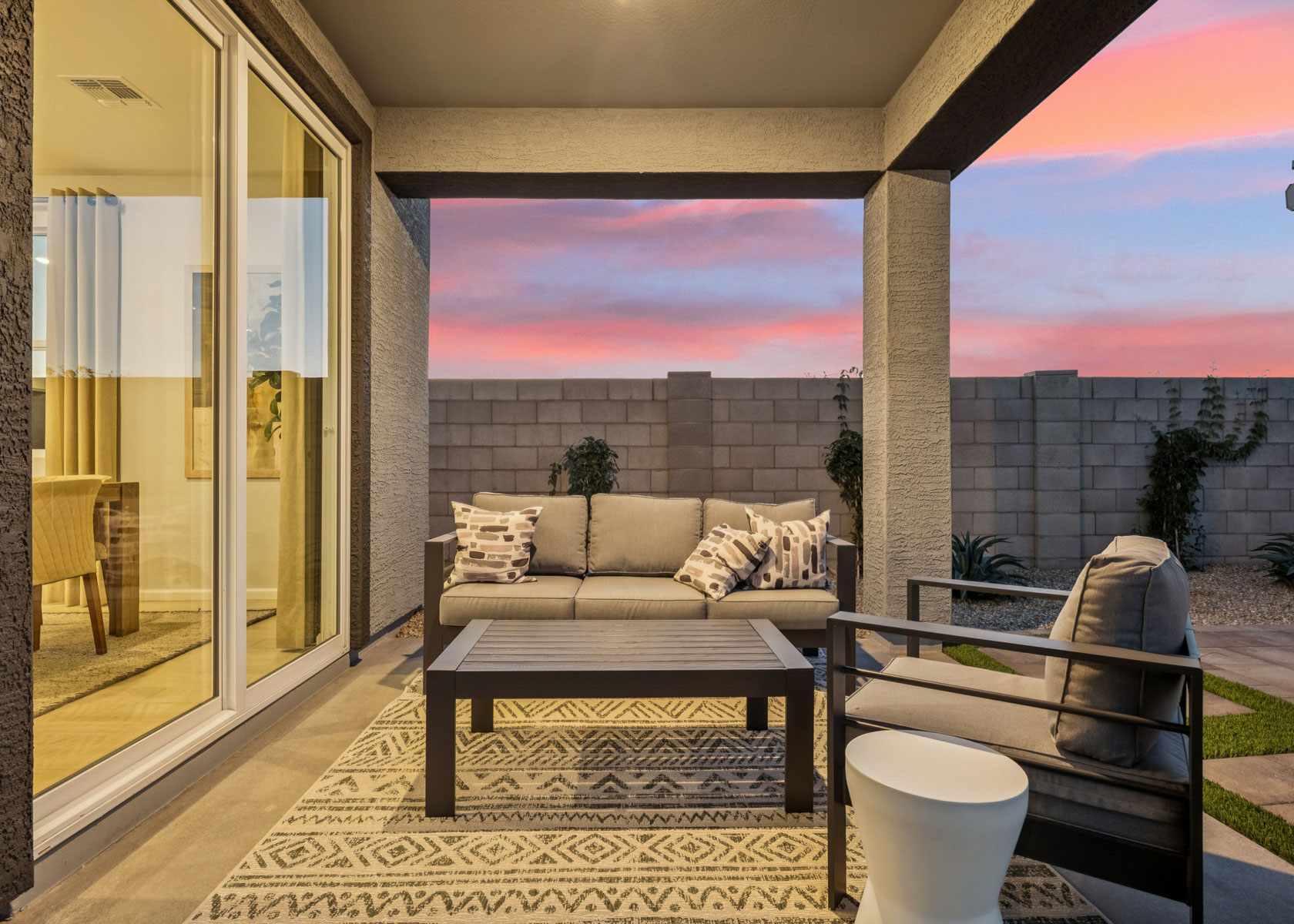 A living room with a glass door.