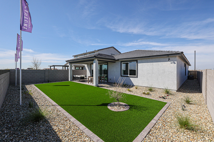 A house with a large front yard.