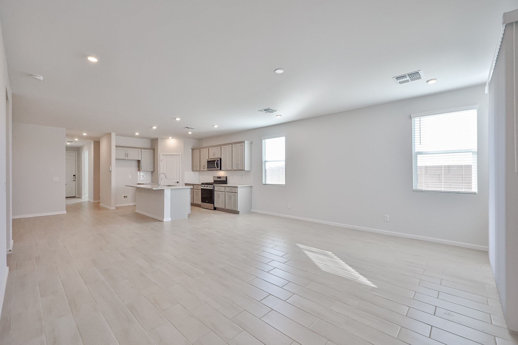 A large empty room with white walls.