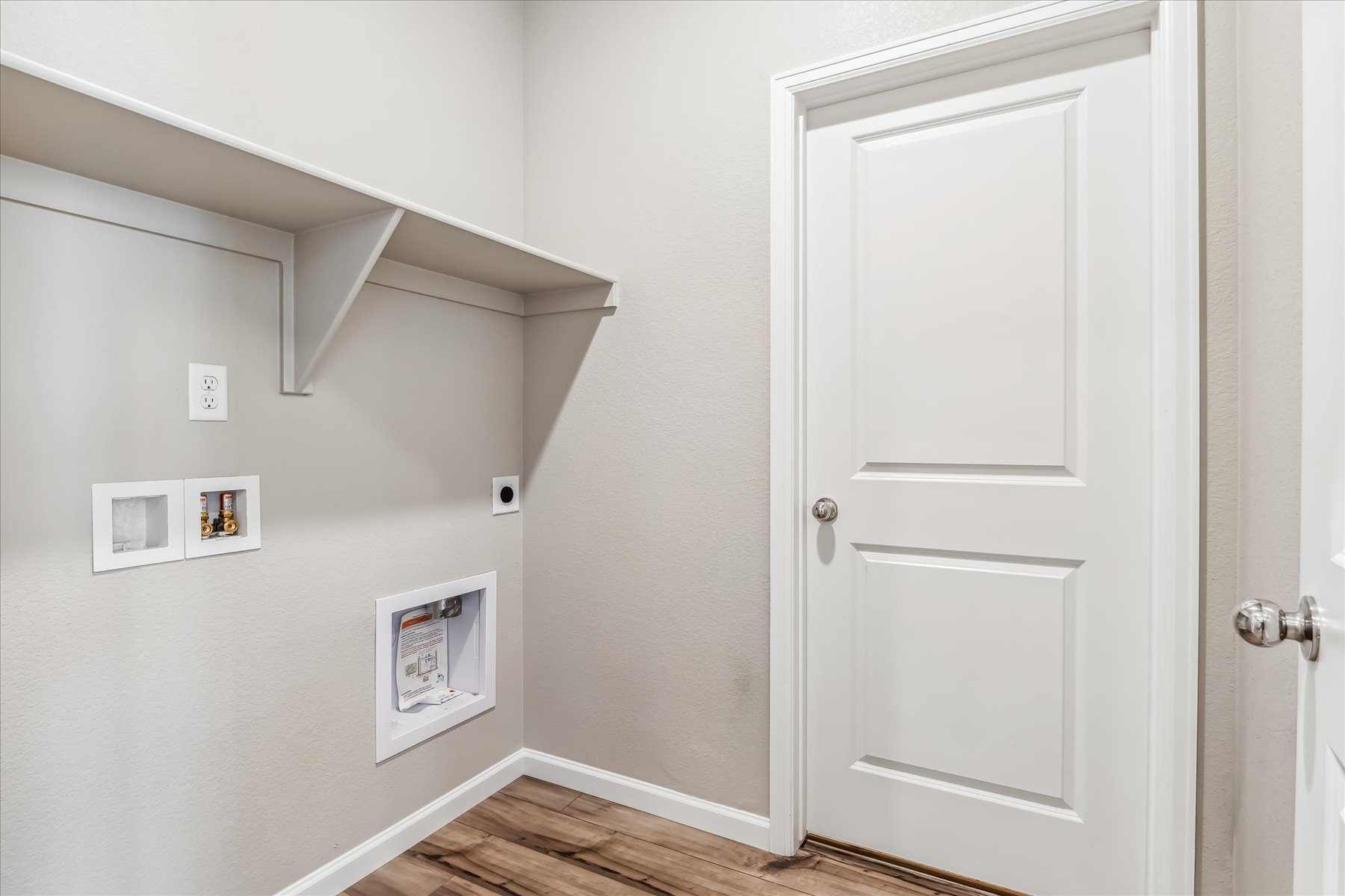 A white door in a room.