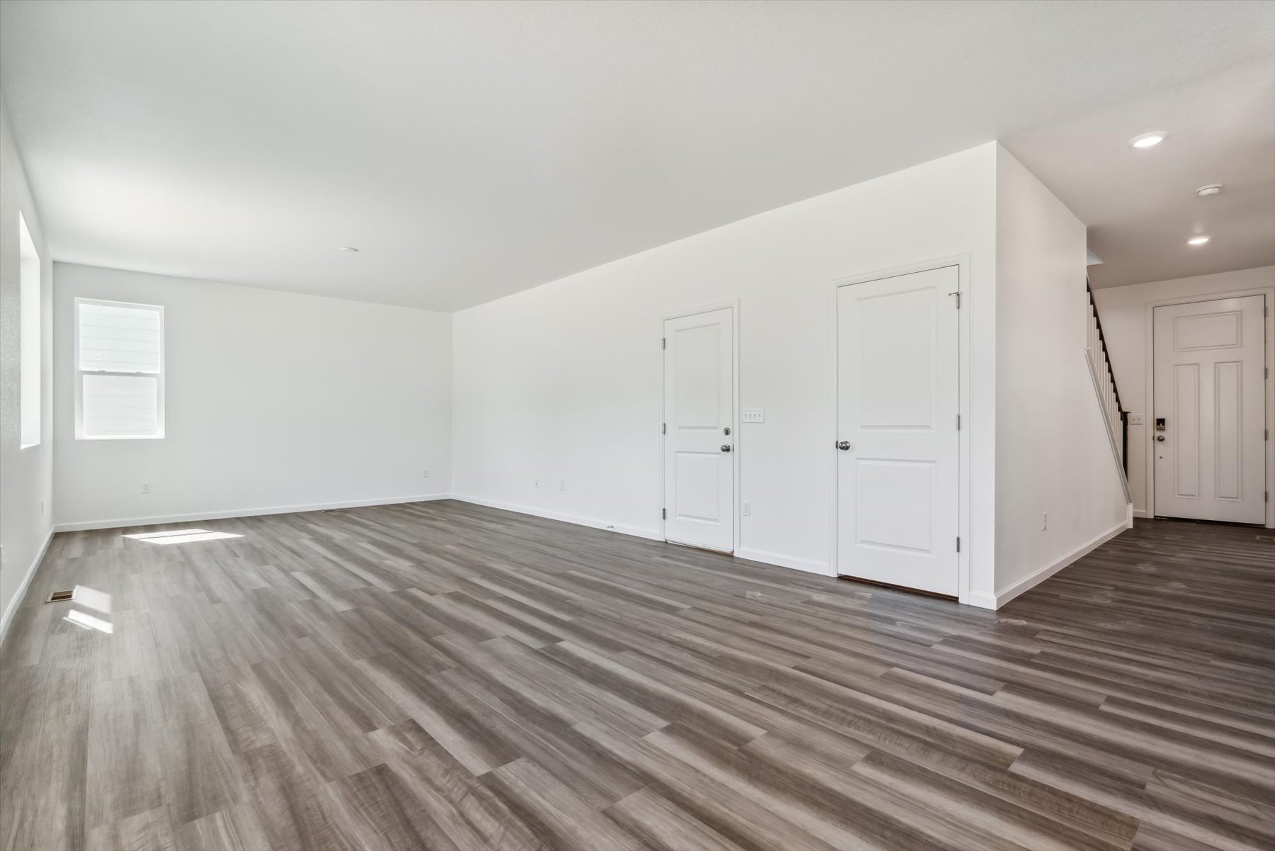 A room with white doors.