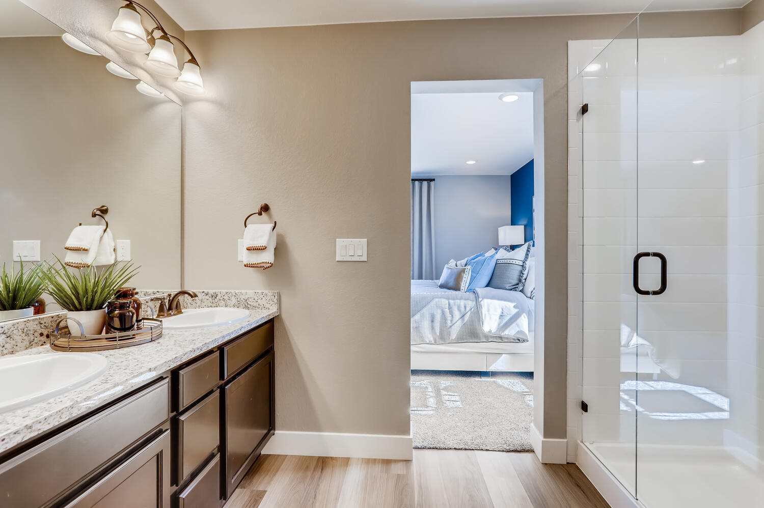 A bathroom with a glass shower.