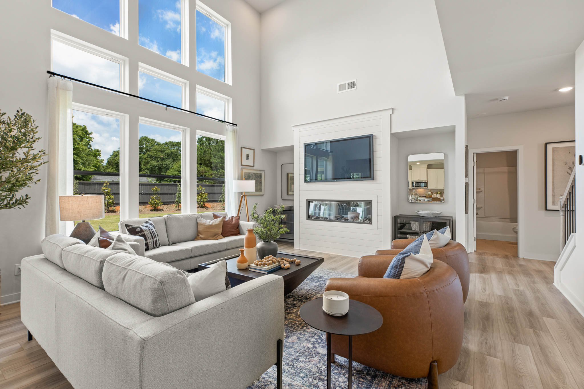 A living room with a large window.