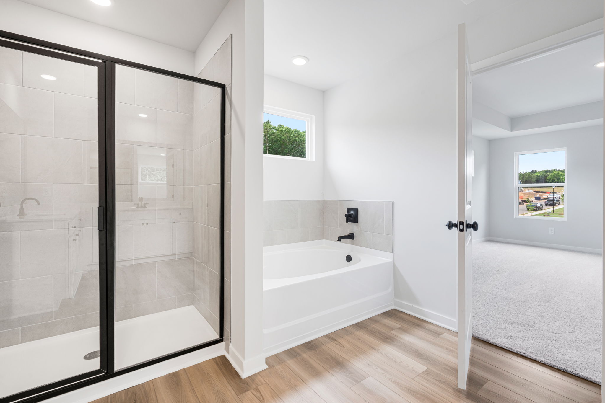A bathroom with a glass shower.