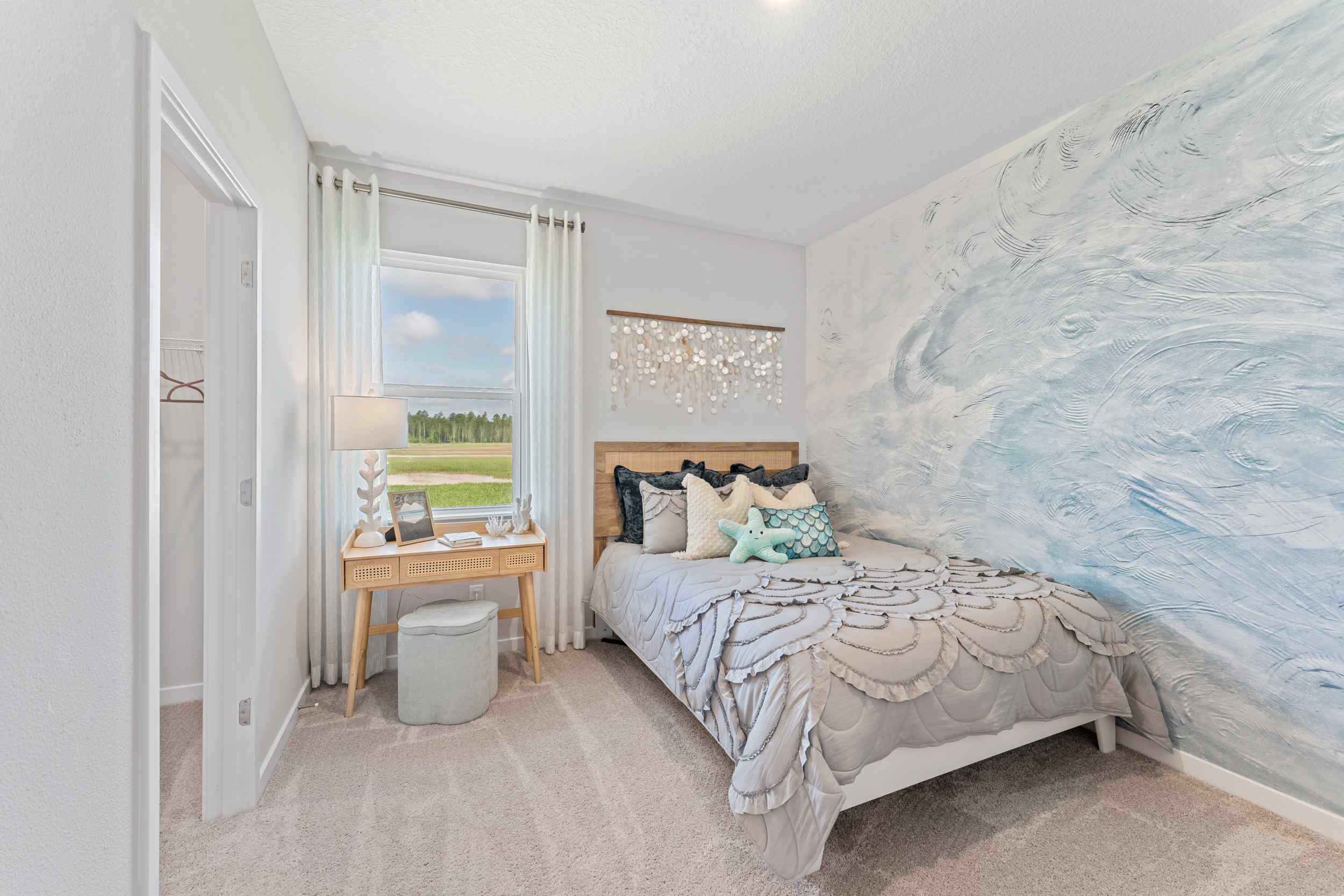 Laurel II Model Home Guest Room with Full Bed and Nautical Theme at Camden Woods in Kingsland, GA