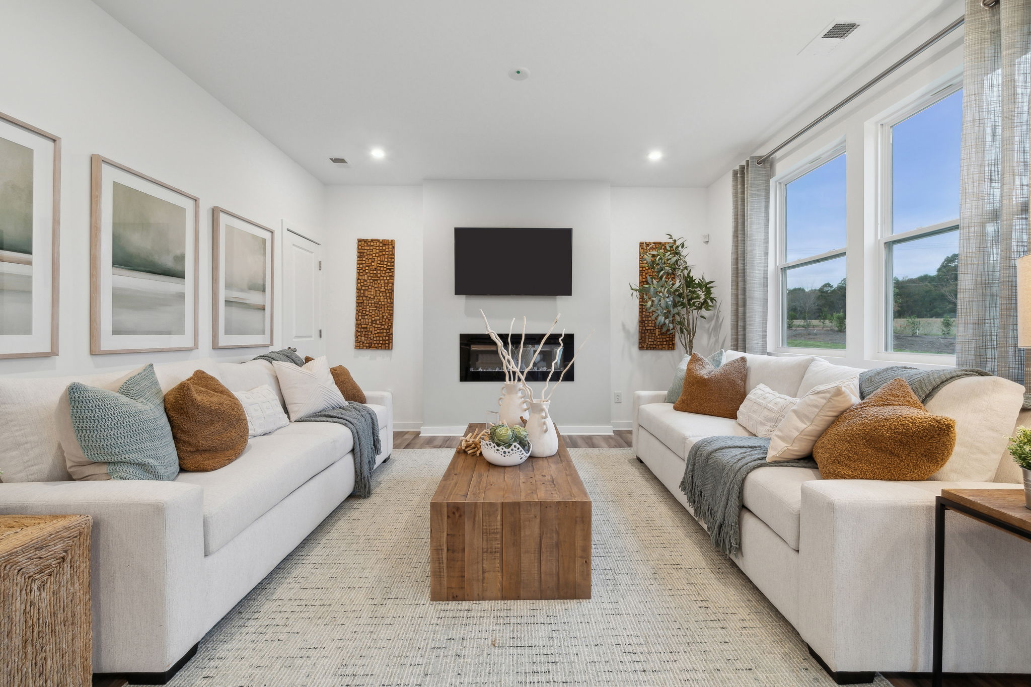 A living room with a large window.