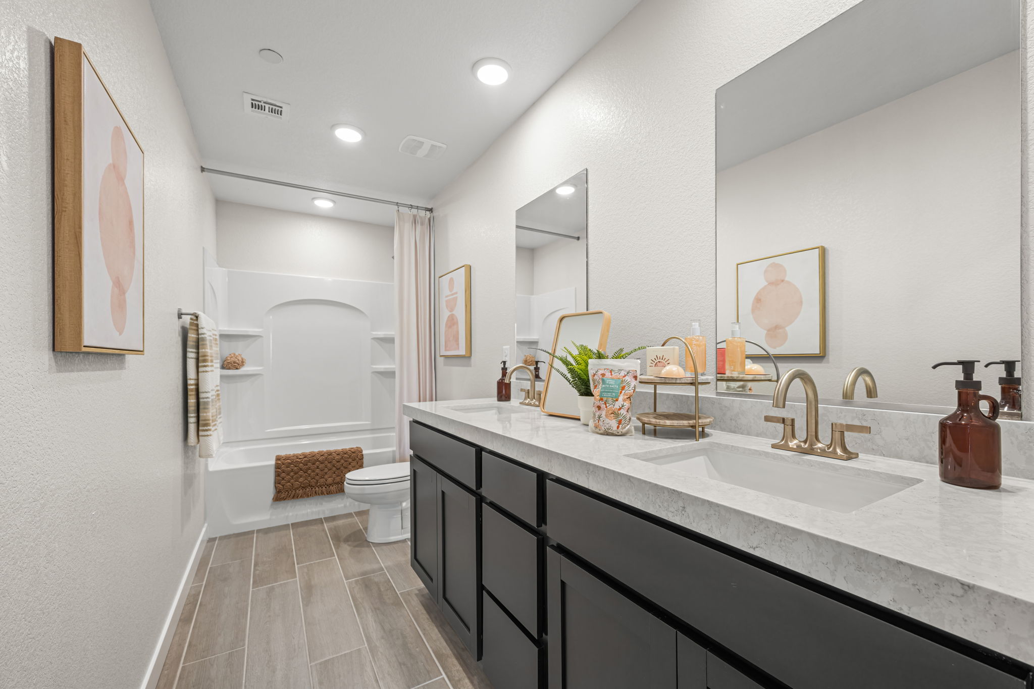 A bathroom with a marble countertop.