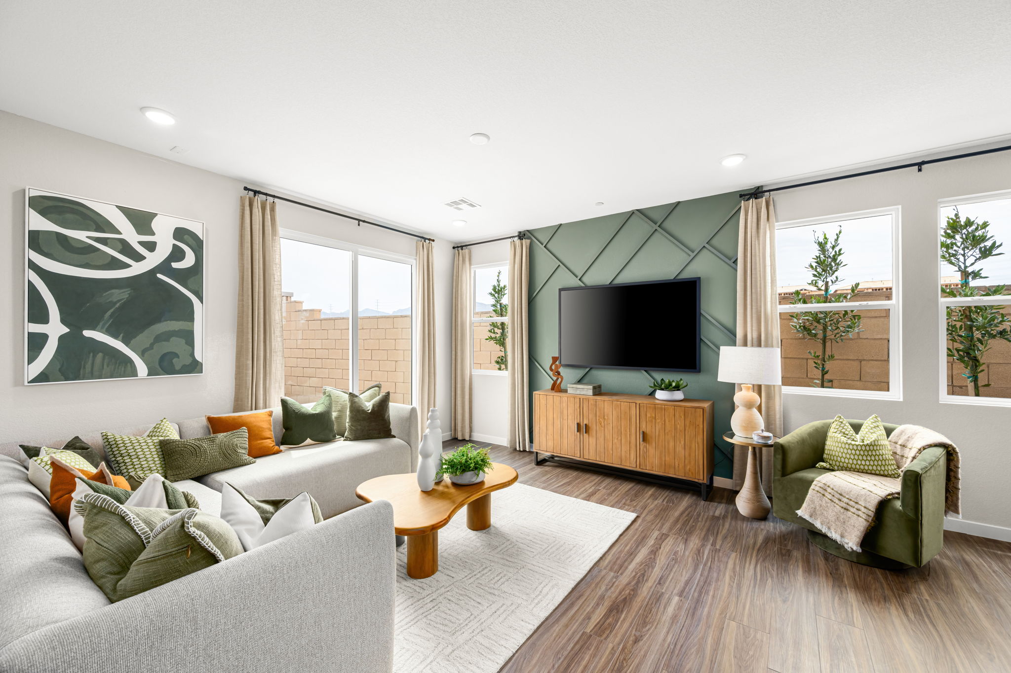 A living room with a tv and couches.