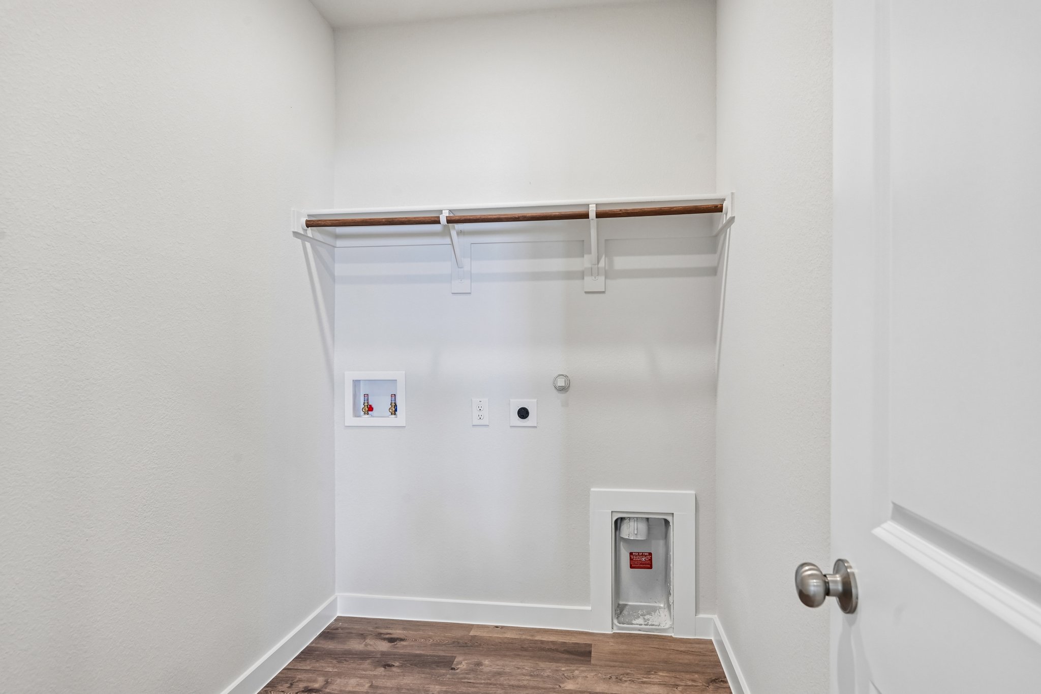 A door with a metal bar.