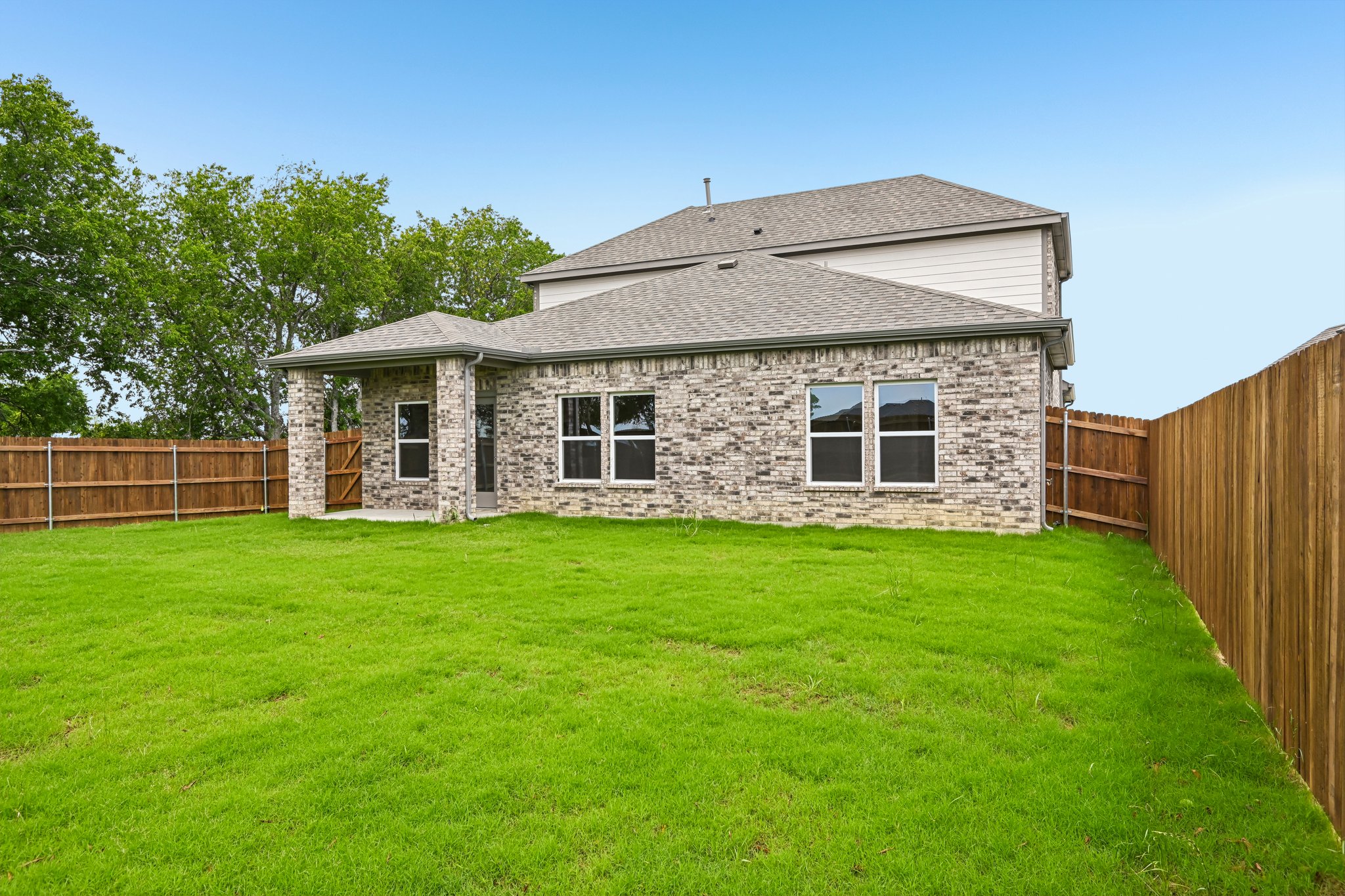 A house with a fence around it.