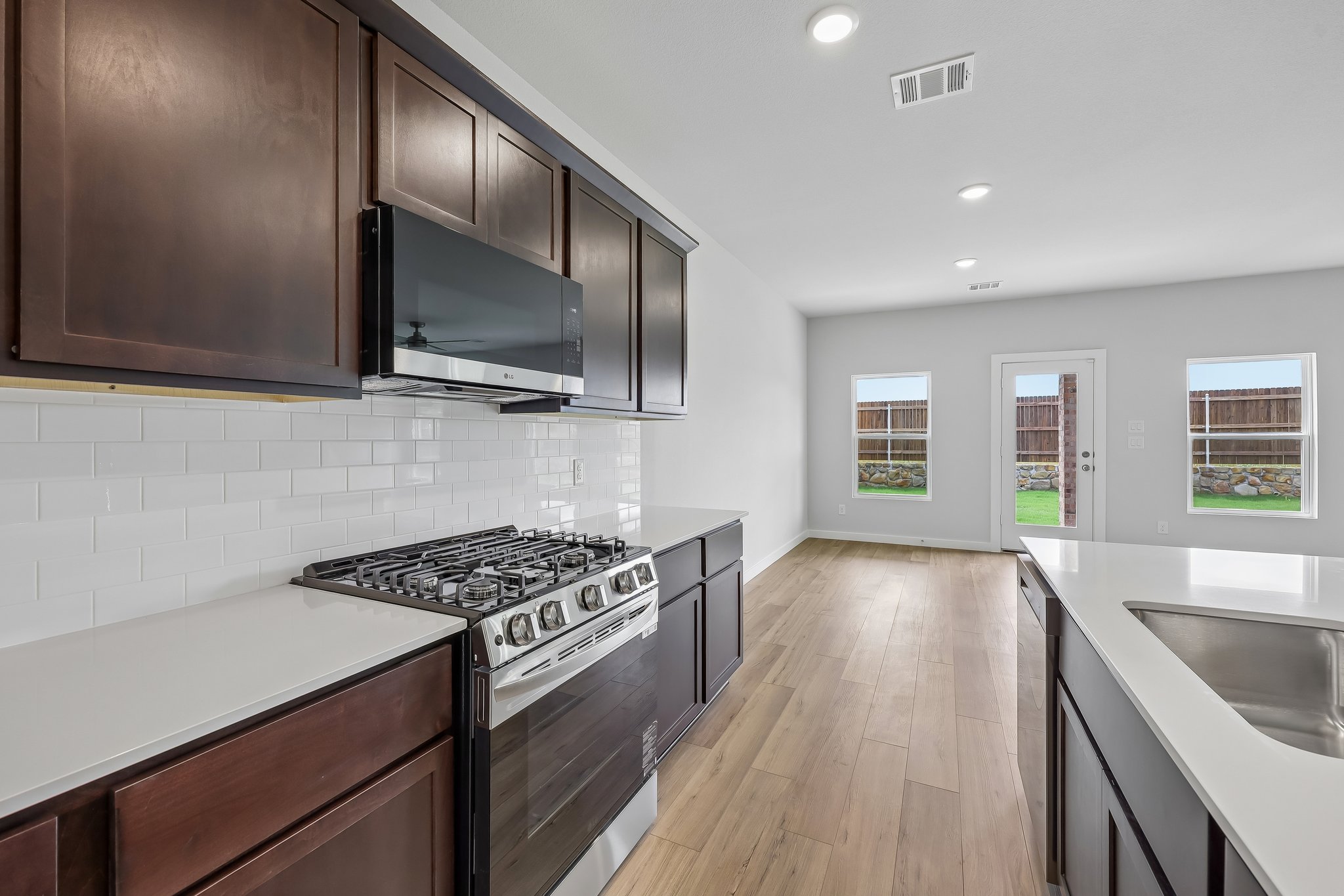 A kitchen with a stove and oven.