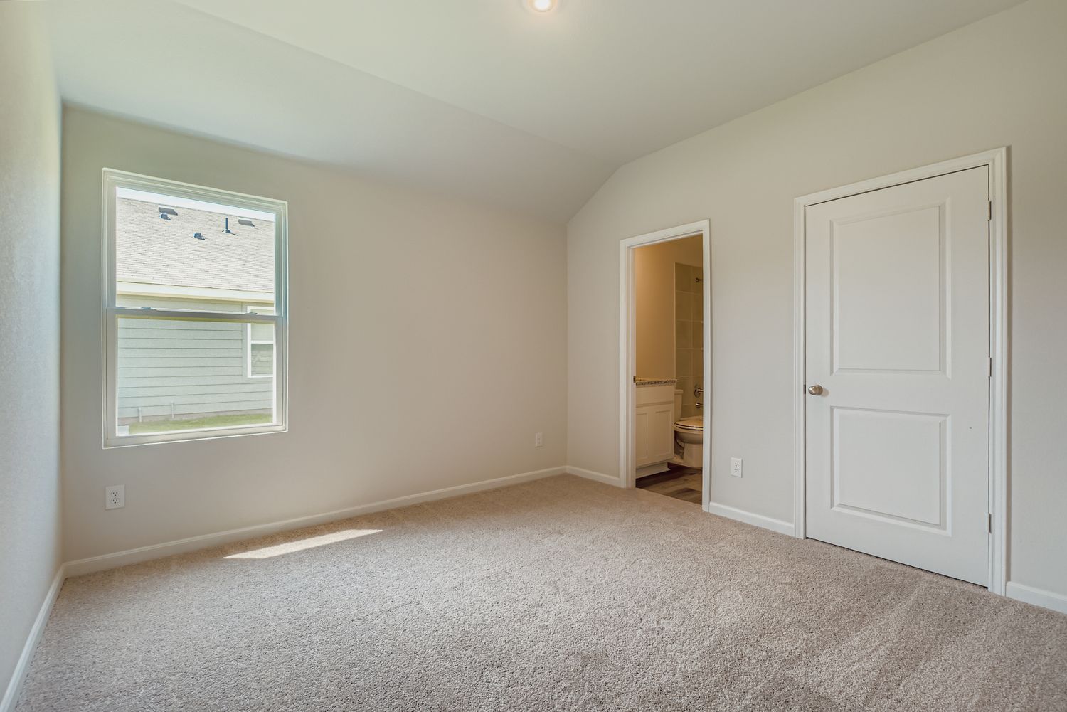 A room with a door and a window.