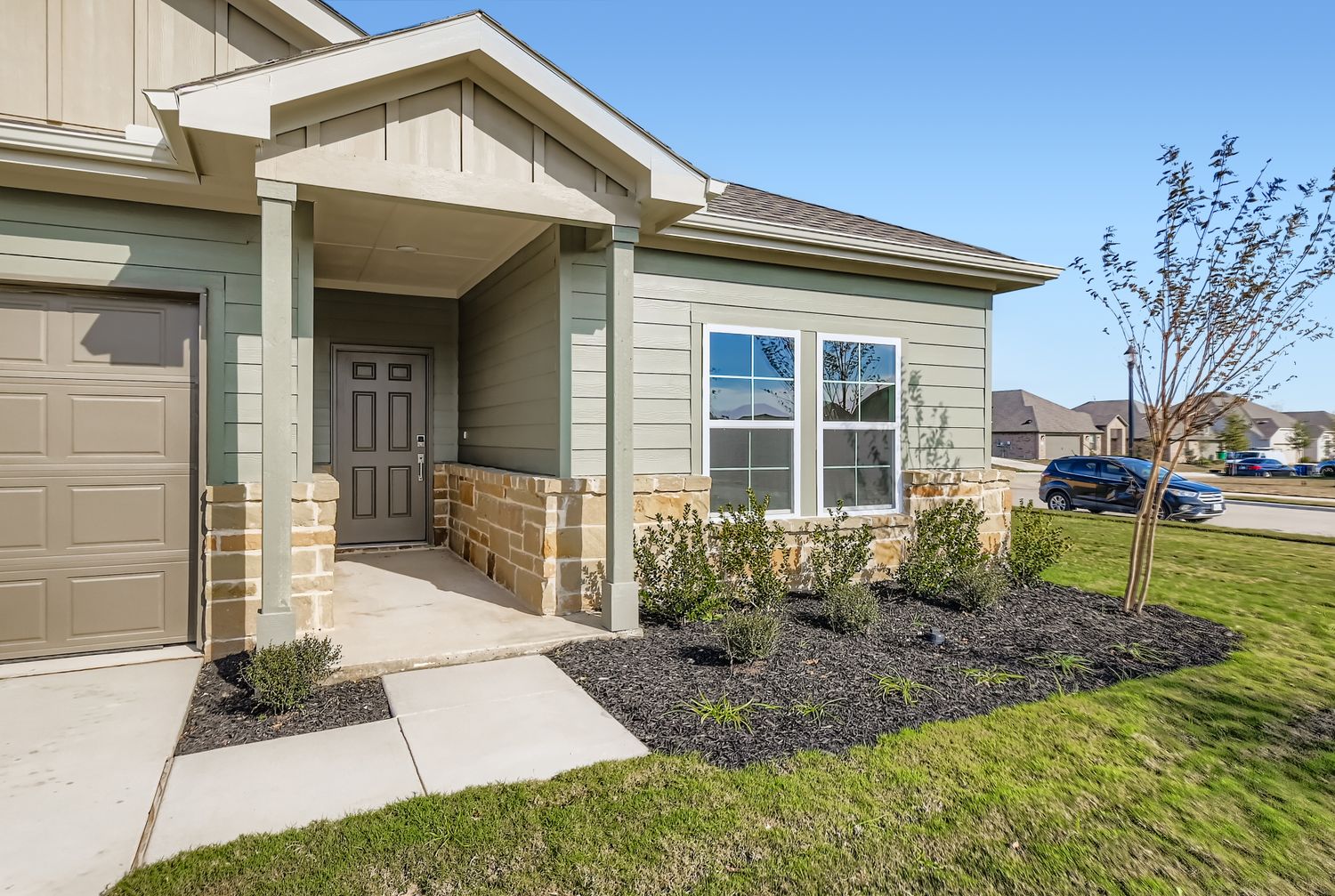 A house with a front yard.