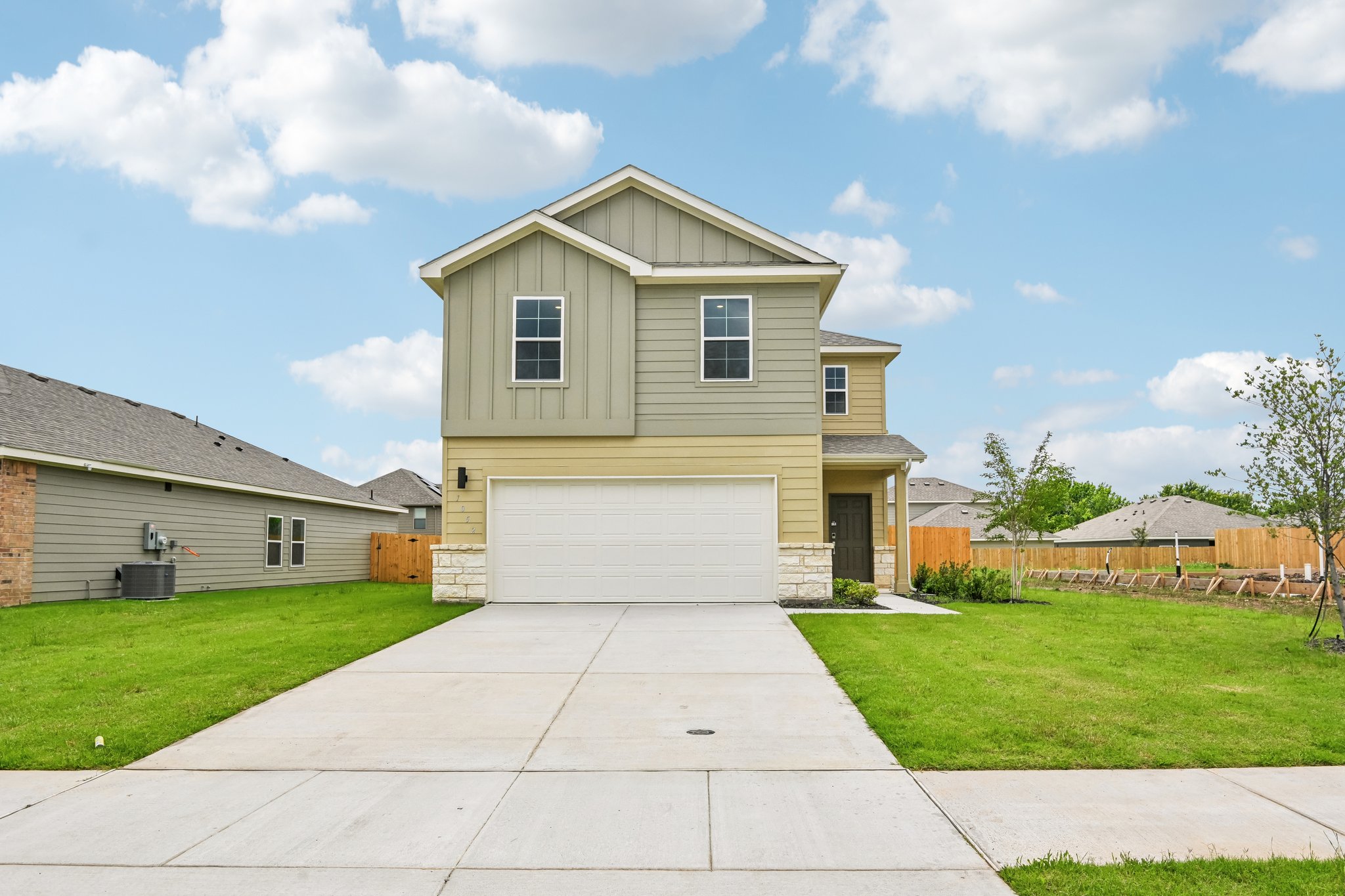 A house with a driveway.