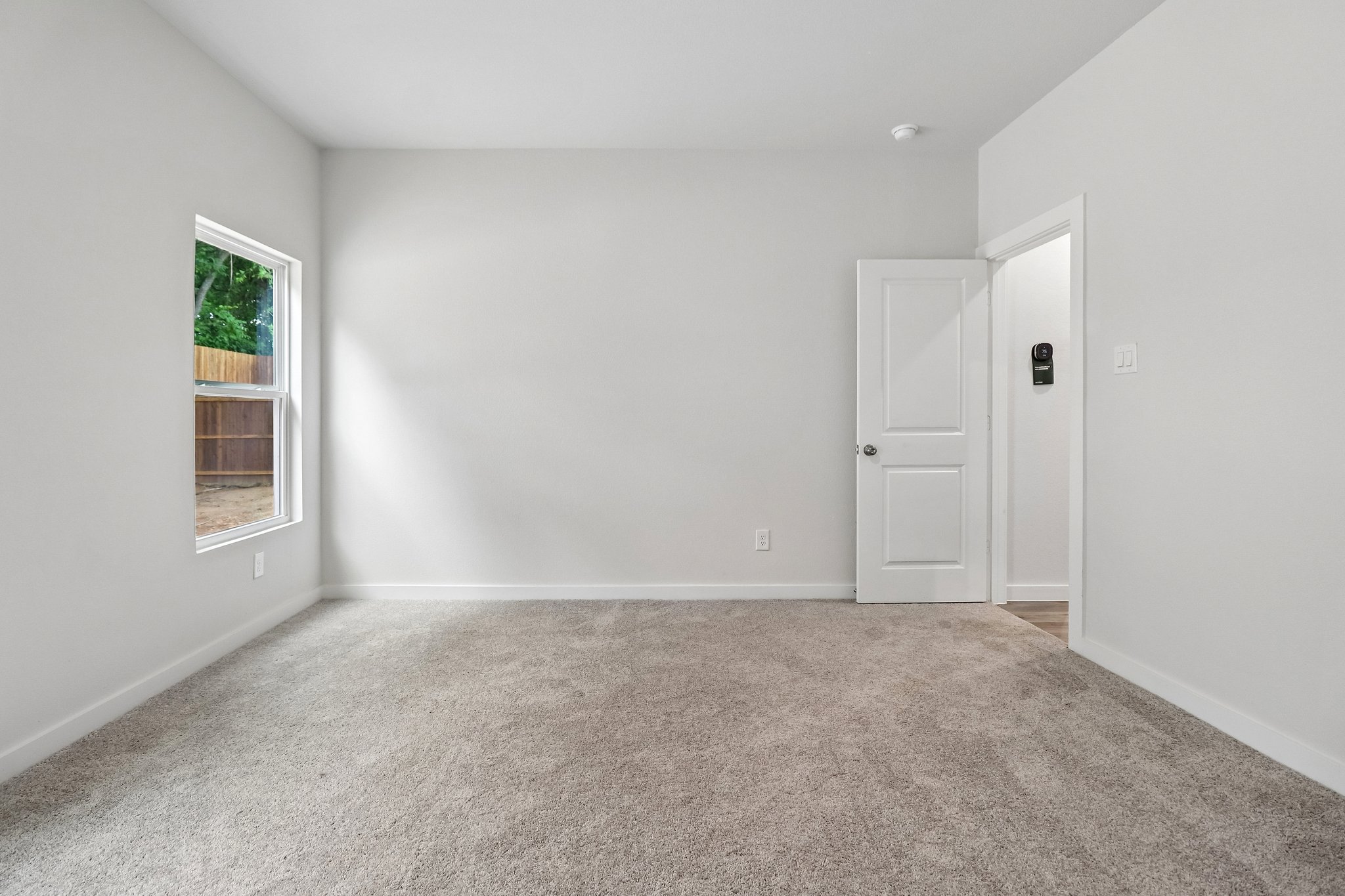 A room with white doors.