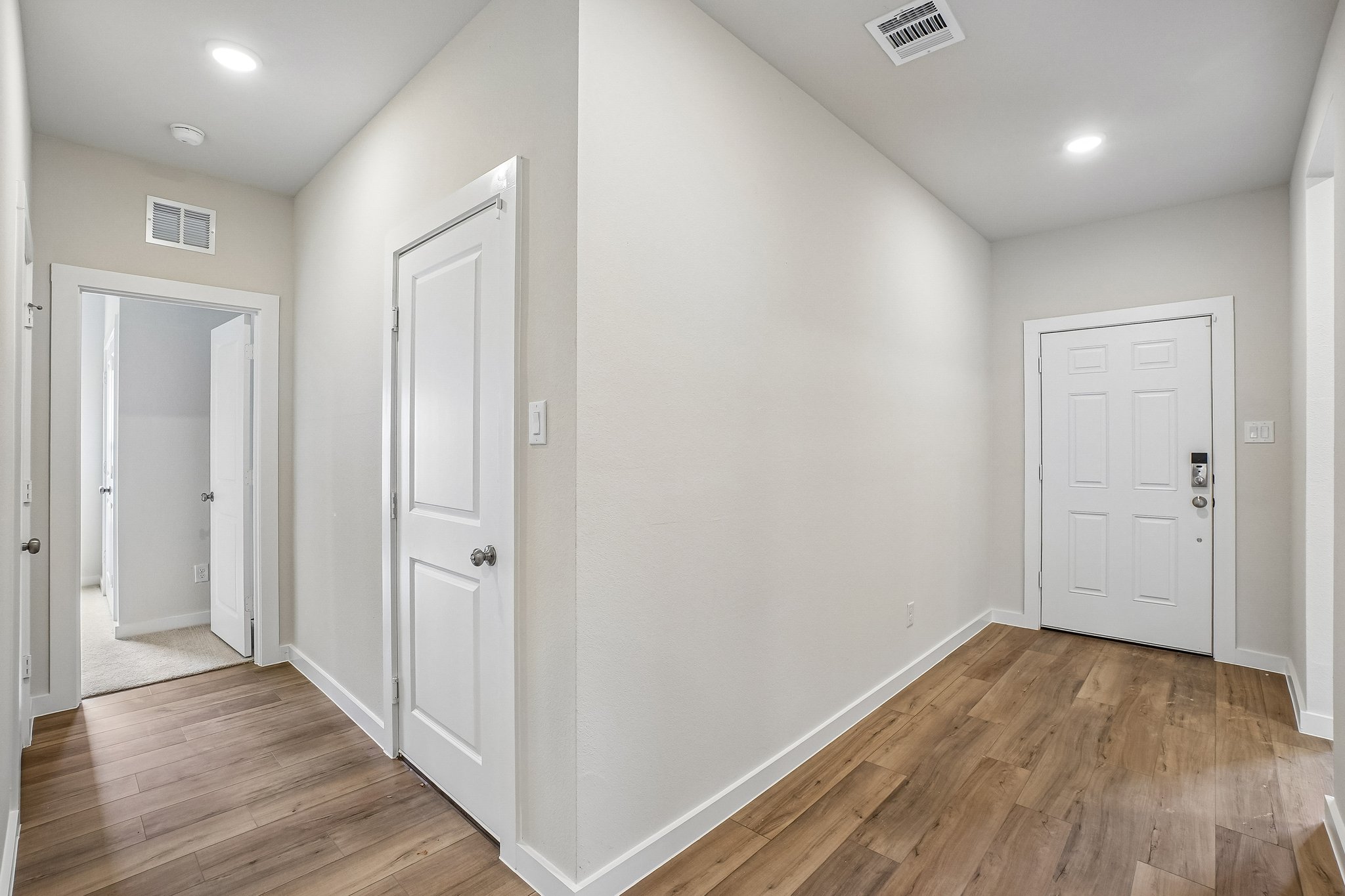 A room with white doors.