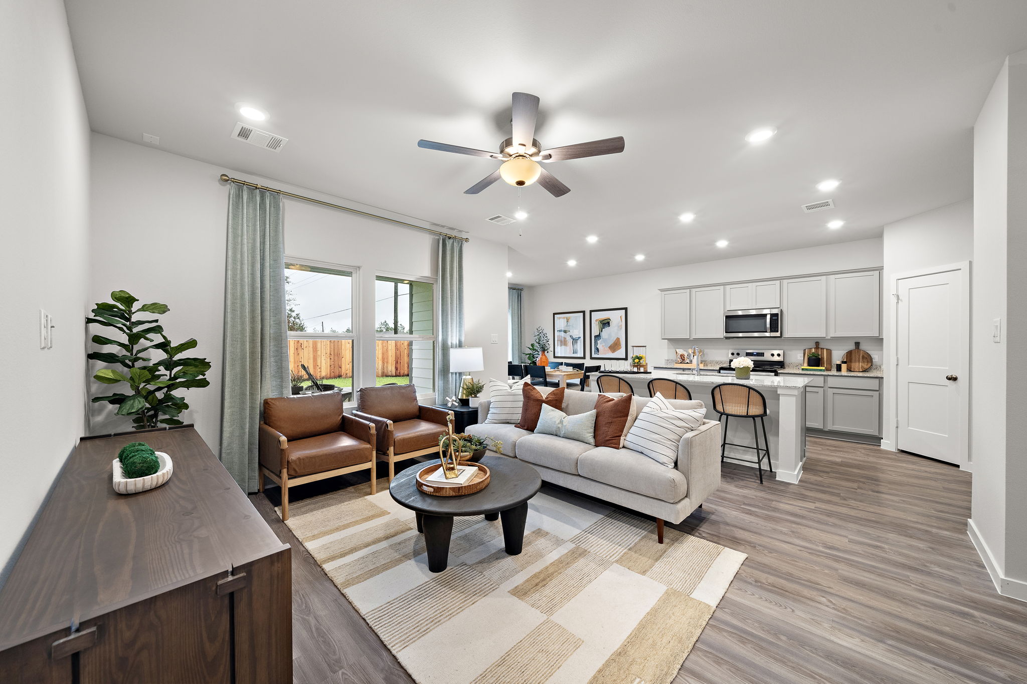 A living room with a large window.