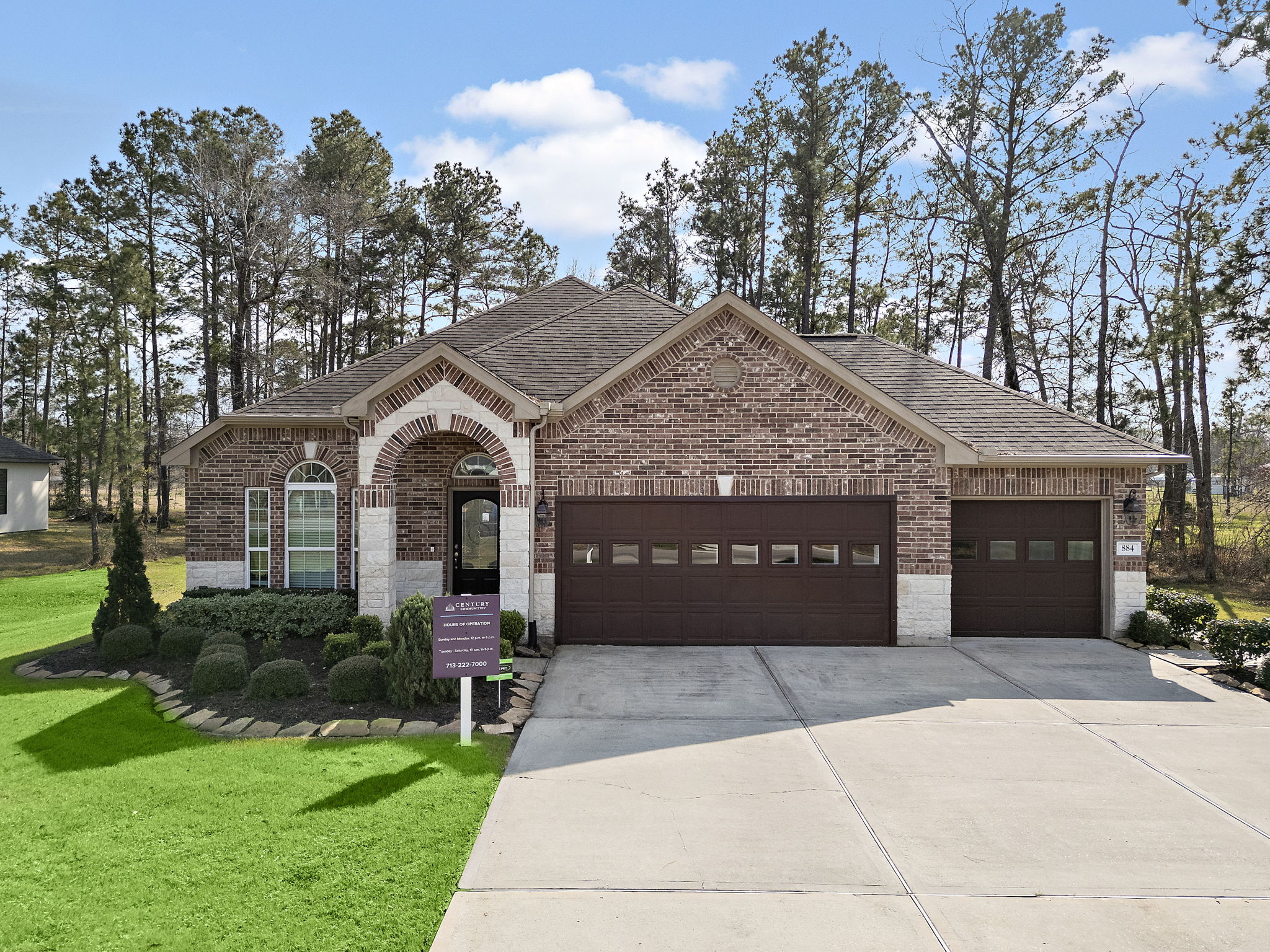 A building with a sign in front of it.