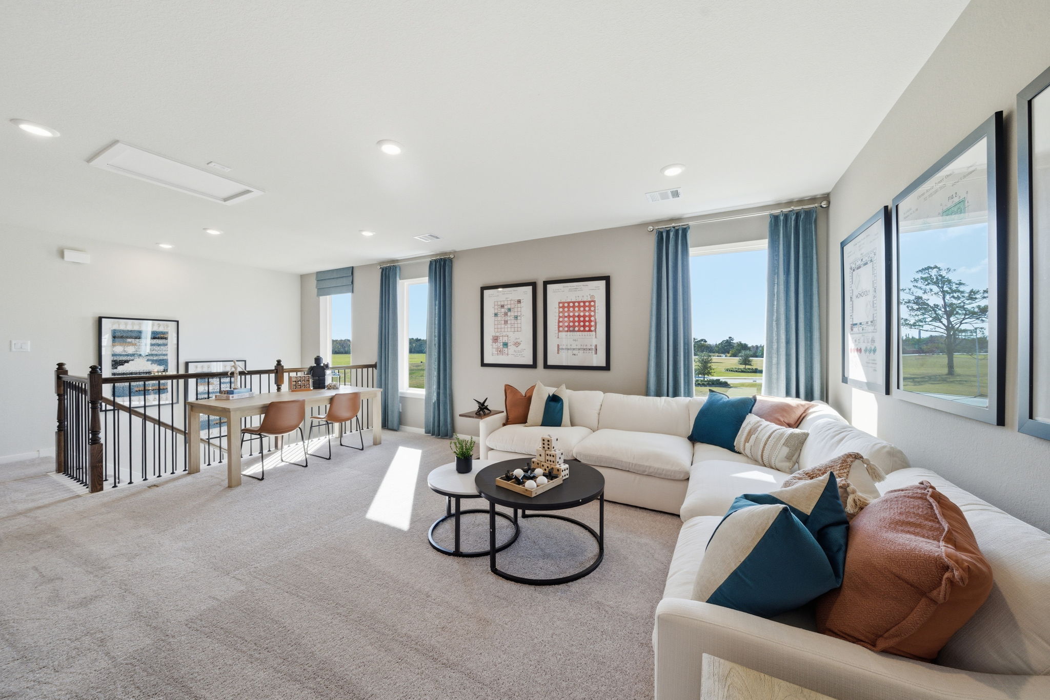 A living room with a large window.