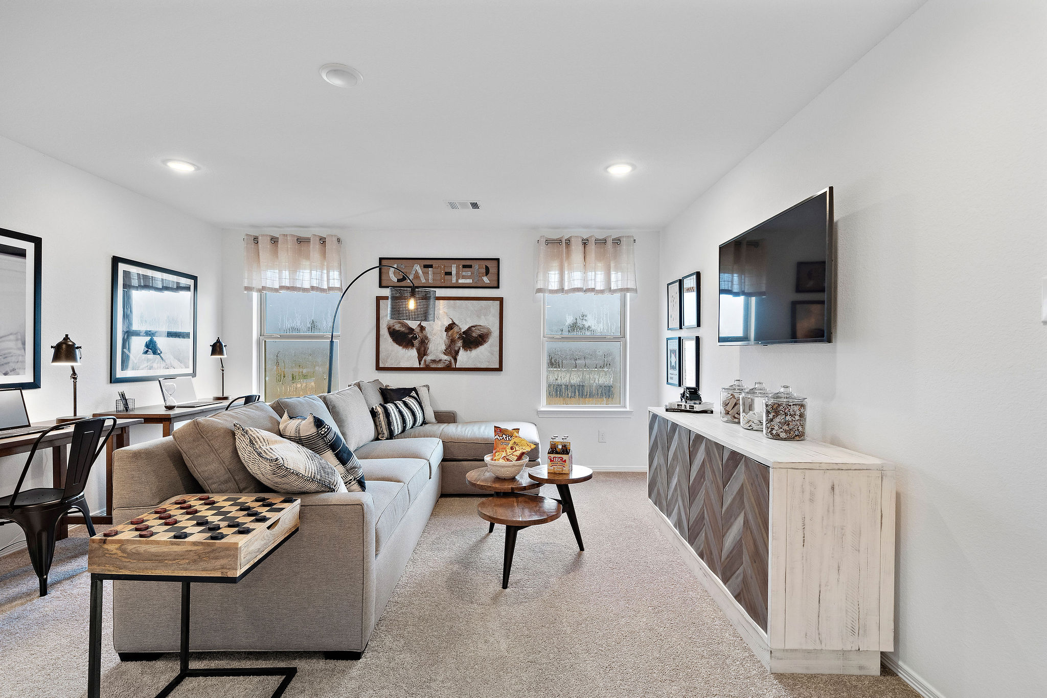 A living room with a couch and a coffee table.
