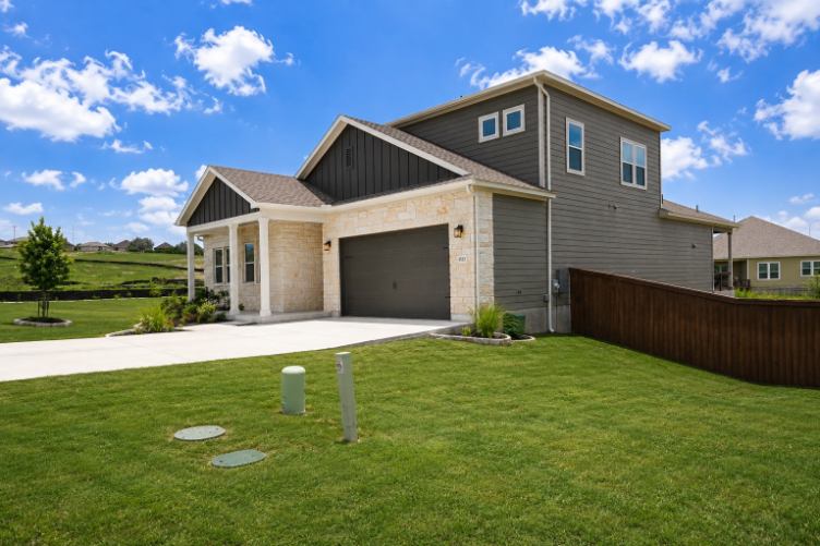 A house with a large front yard.