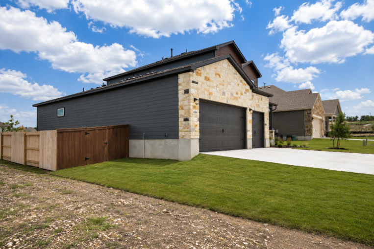 A house with a fence around it.