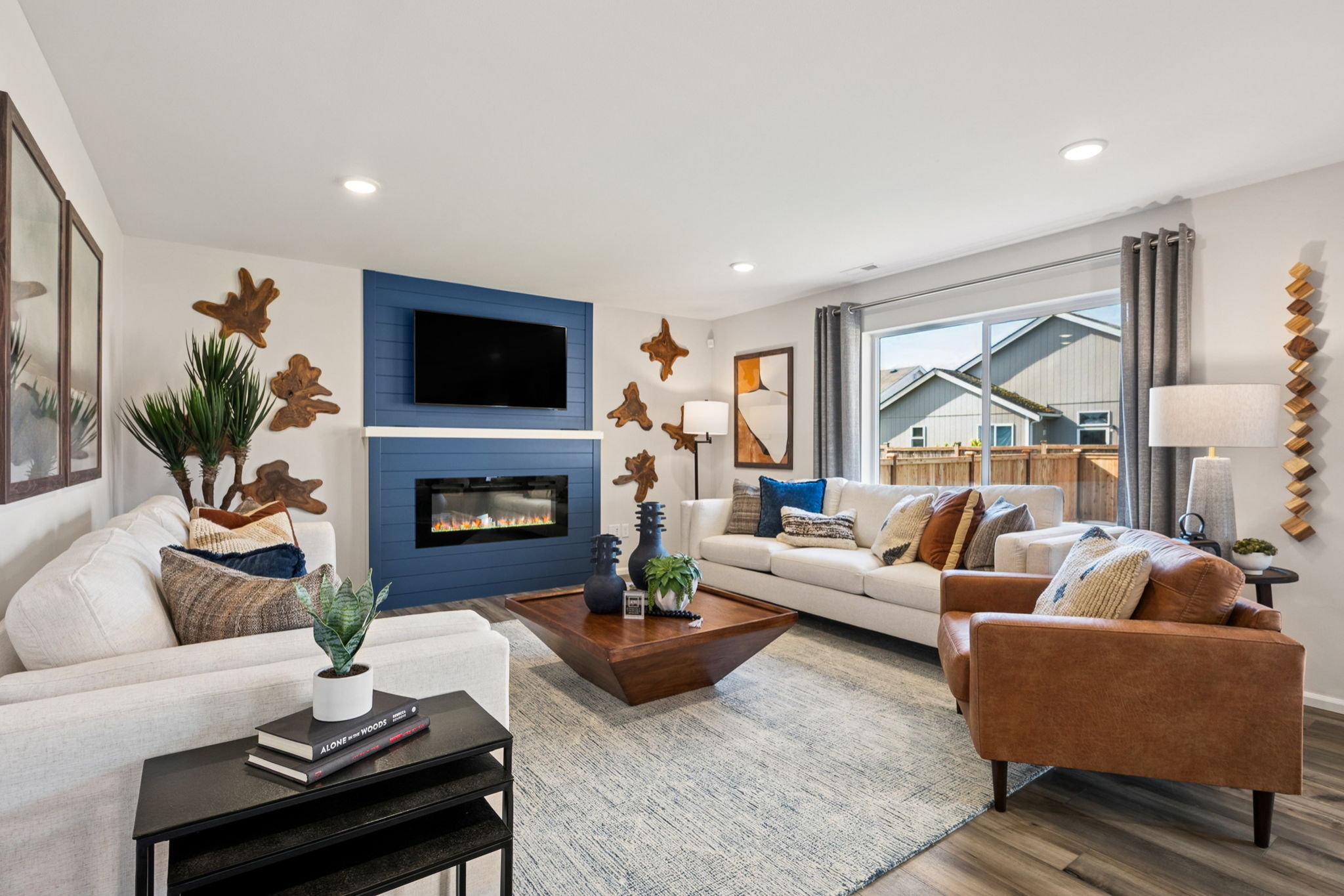 A living room with a fireplace.