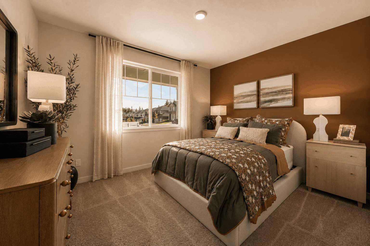 A bedroom with a bed and lamps.