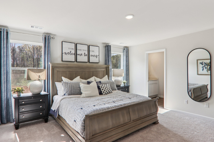 A bedroom with a large bed.