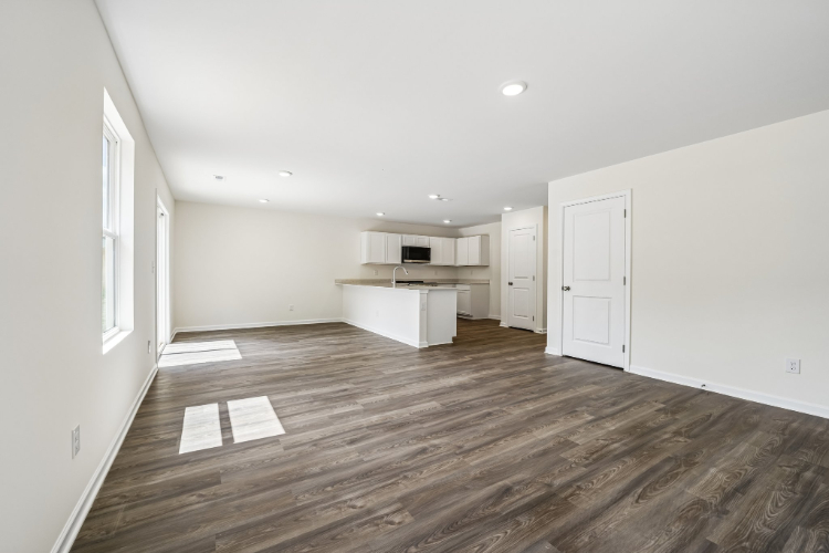 A room with white cabinets.