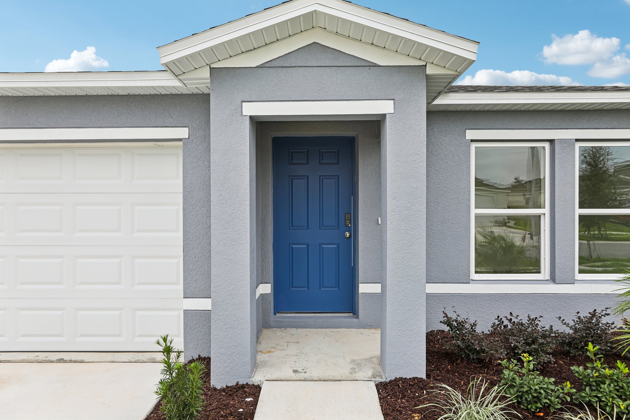 A house with a blue door.
