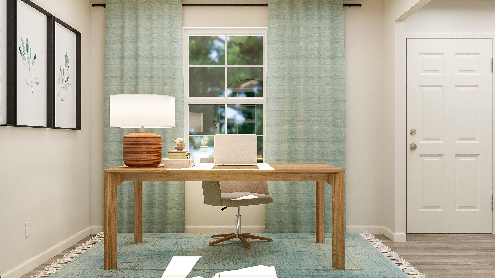 A table with a laptop on it.