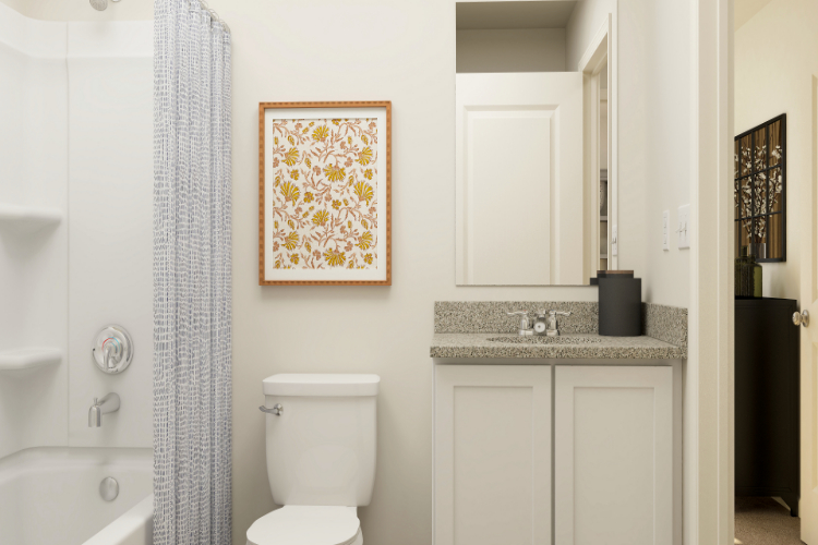 A bathroom with a toilet and sink.